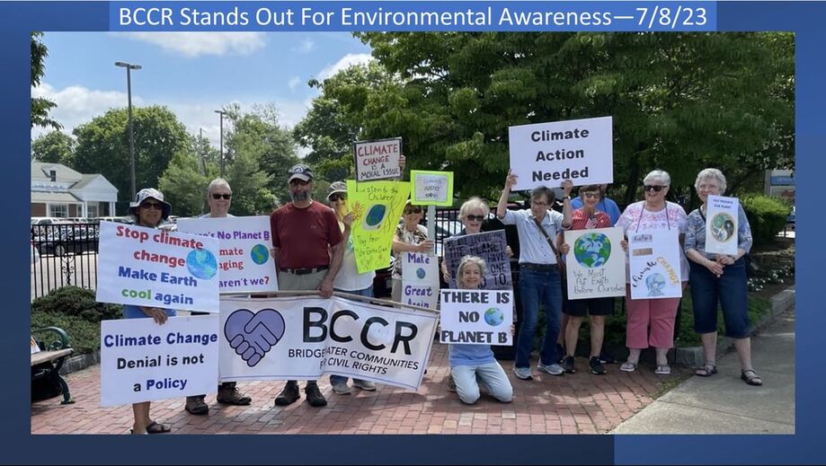 BCCR stands out for Environmental Awareness, 7/8/23. Individuals' signs say, 