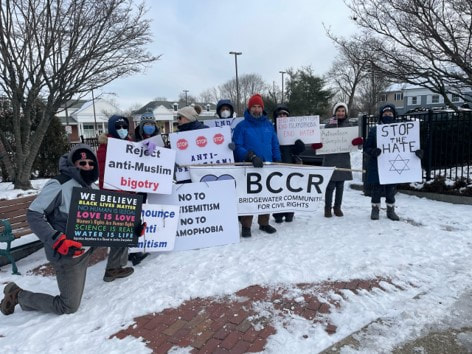 BCCR members hold the BCCR banner and  signs saying “Reject anti-Muslim bigotry,” “No to Antisemitism and no to Islamophobia,” “Stop the hate,” with Star of David, “Stop stop stop antisemitism,” “No Islamophobia, no Antisemitism, End Hate”