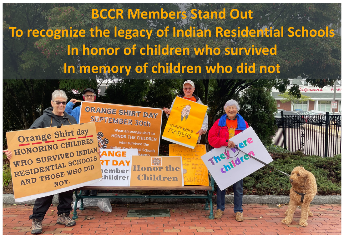 BCCR Members hold signs at a standout to recognize the legacy of Indian Residential Schools. In honor of children who survived. In memory of children who did not.