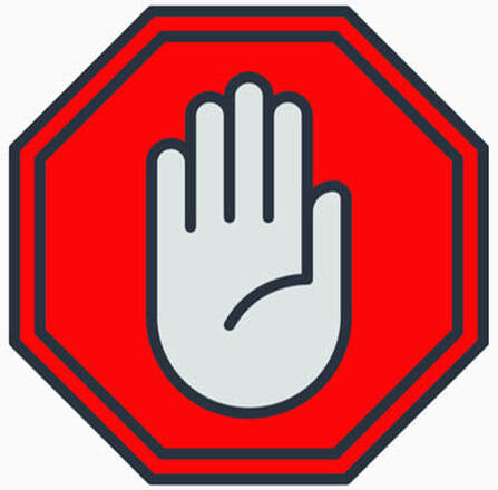 Stop sign with a hand in the 